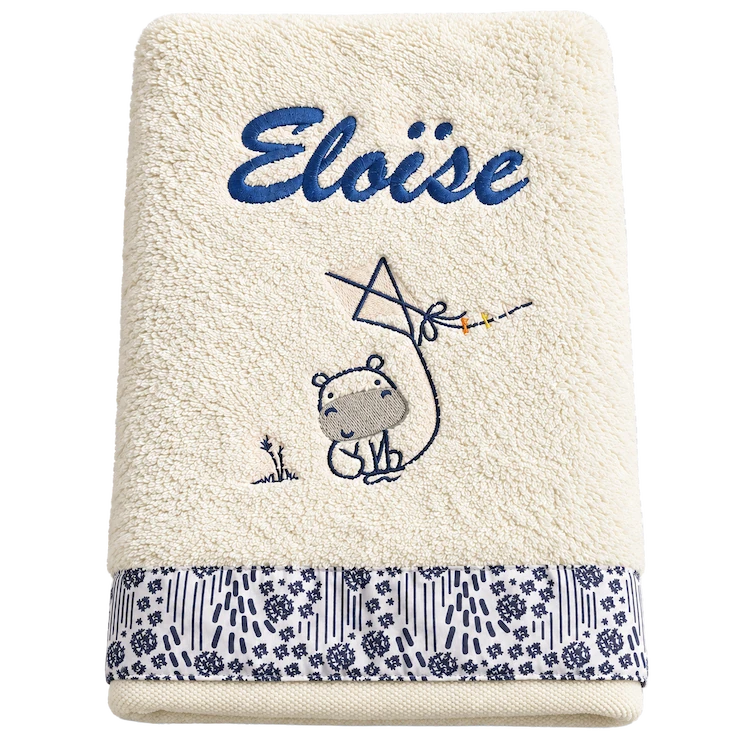 Serviette Éloïse brodée Serviette écrue brodée au prénom Éloïse avec un hippopotame et un cerf-volant